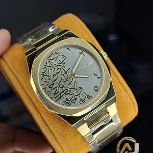 Universe Point Arabic calligraphy Watch Available At the top of everyone’s favorites Color : Gold / Grey