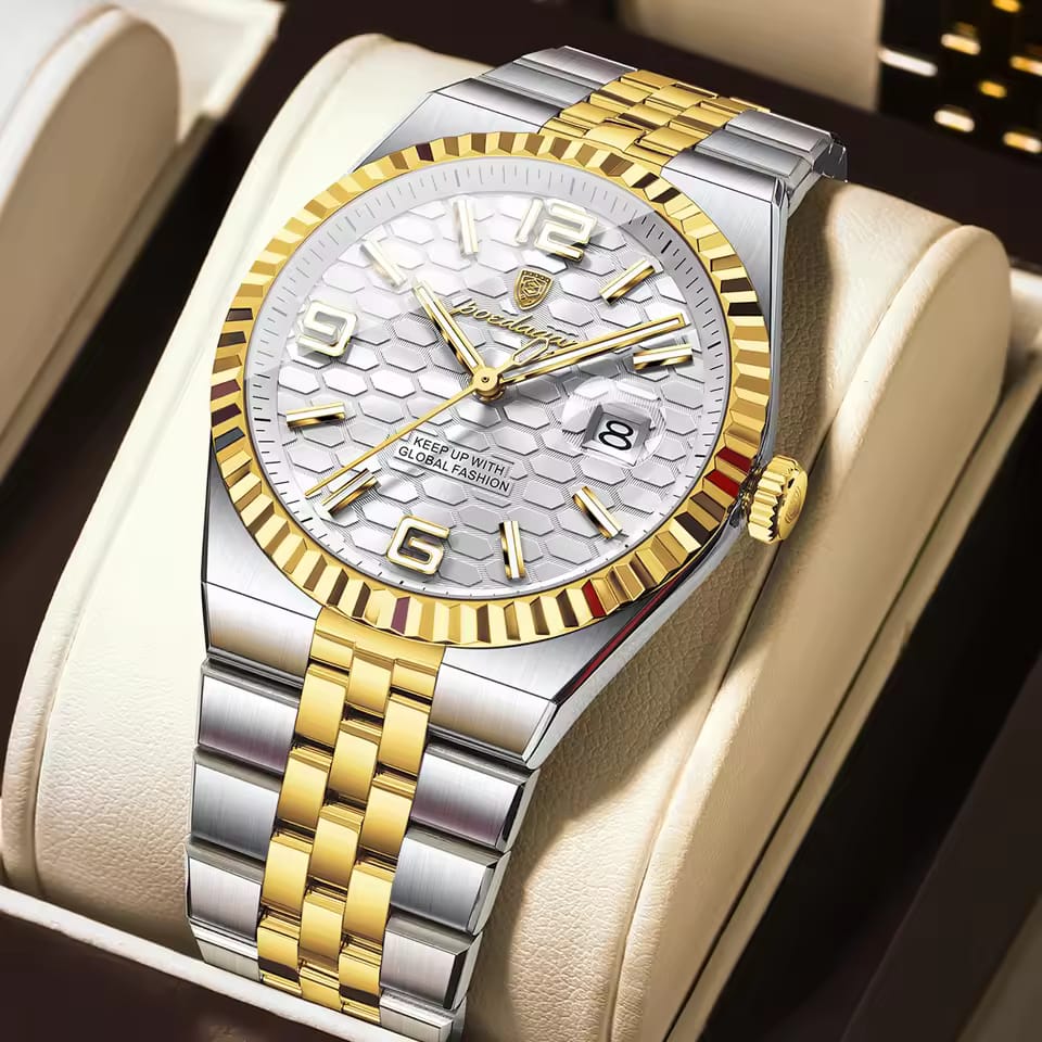 A close-up of the POEDAGAR 839 T.White watch, showing its two-tone silver and gold band and white honeycomb dial.