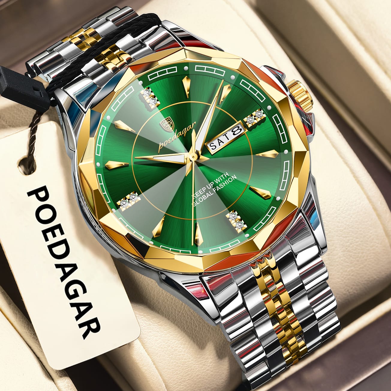 A POEDAGAR 674 men's watch with a green dial, and a two-tone gold and silver stainless steel band, resting in its box.