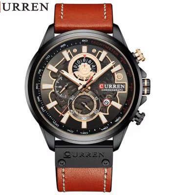 A CURREN 8380 chronograph men's watch with a brown leather strap and rose gold details, displayed on a dark textured surface.