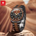 Front view of the OLEVS 3645 Wood & Steel Moon Phase Chronograph resting on a piece of wood, showing its detailed dial.