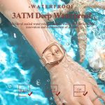 A woman's arm submerged in water, wearing the POEDAGAR 783 waterproof female watch in a luxury rose gold finish.