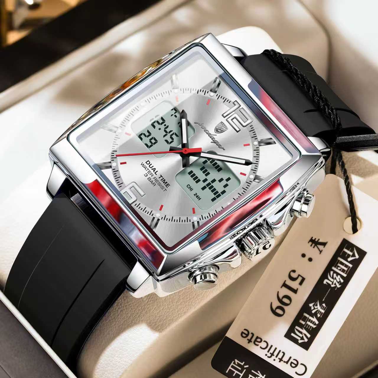 POEDAGAR E109 Chronograph Digital Watch A POEDAGAR E109 Chronograph Dual Time Digital Watch with a square silver case, silver dial, and a black silicone strap.