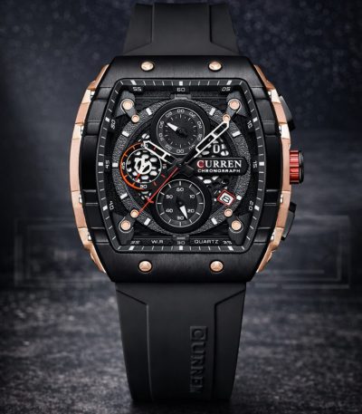 A CURREN 8442 chronograph men's watch shown upright. It features a black silicone band and a rose gold and black case.