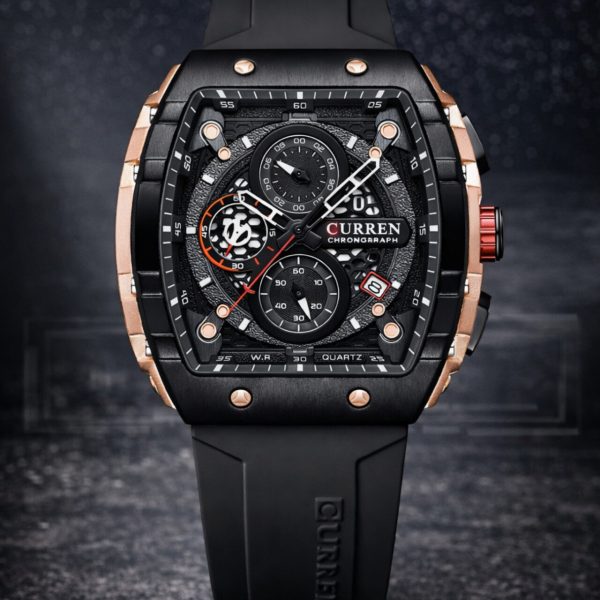 A CURREN 8442 chronograph men's watch shown upright. It features a black silicone band and a rose gold and black case.