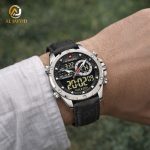 A man's wrist wearing the NAVIFORCE NF9208 PU Leather Dual Time Watch with a black dial and silver case outdoors.