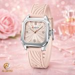 A Curren 9113 women's watch with a pink silicone strap and a square silver case. The watch face is also pink with a textured pattern.