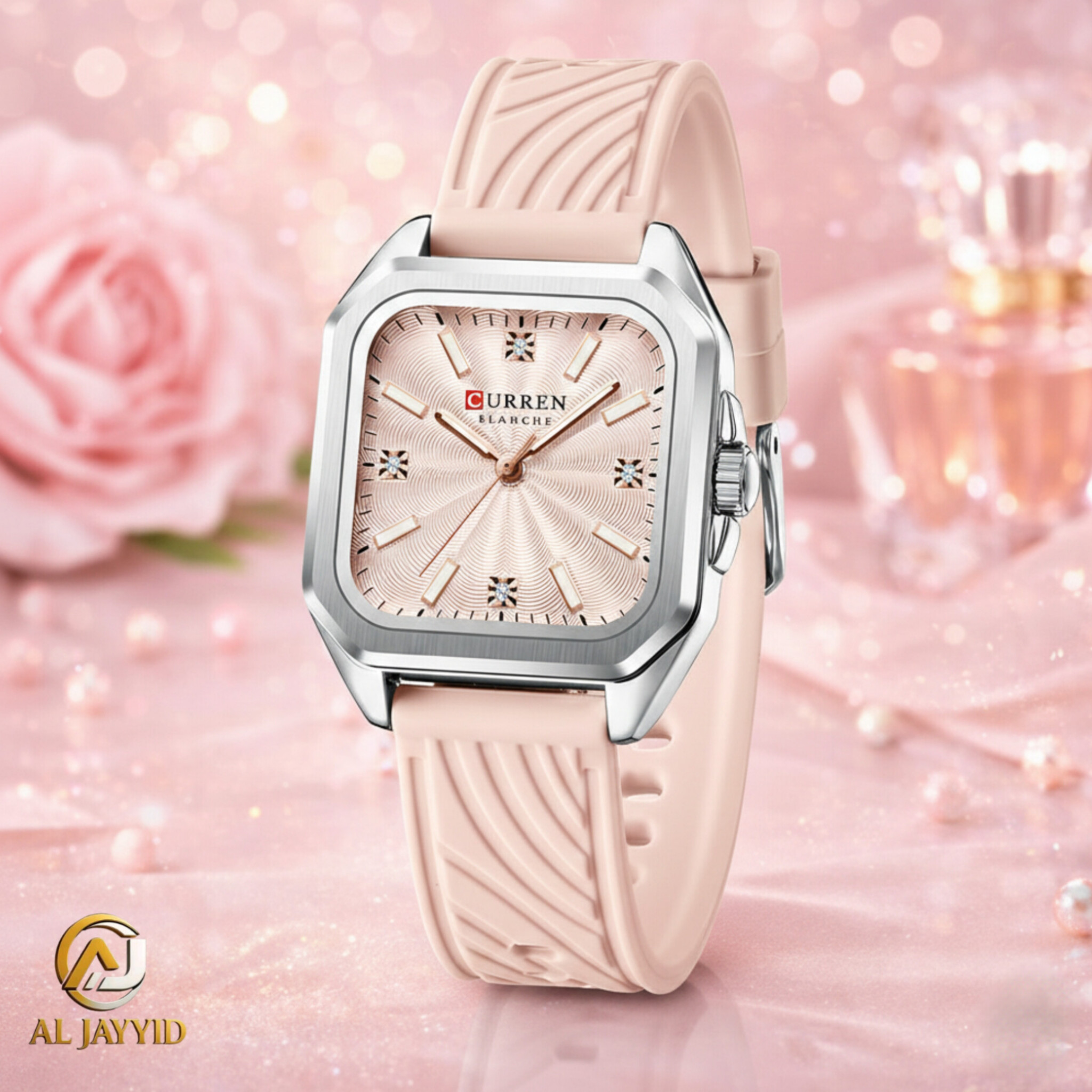 A Curren 9113 women's watch with a pink silicone strap and a square silver case. The watch face is also pink with a textured pattern.