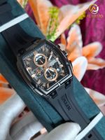 A close-up of the CURREN 8488 men's square chronograph watch, featuring a black case, rose gold details, and a black strap.