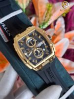 A close-up of the CURREN 8488 Men's Square Chronograph Watch with a gold case and black silicone strap, resting on its box.