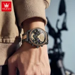 A man's wrist wearing the OLEVS 3645 Wood & Steel Moon Phase Chronograph watch with a black dial and mixed material band.