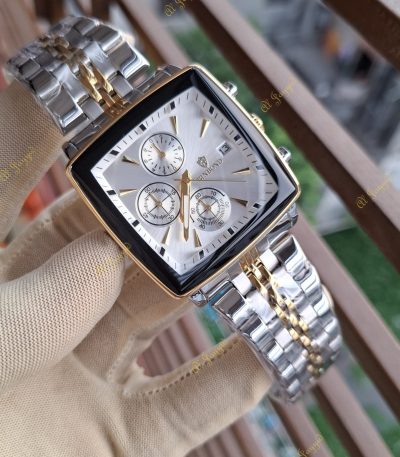 A gloved hand holding the Binbond 911 Original Men's Luxury Watch, showing its two-tone silver and gold metal bracelet.