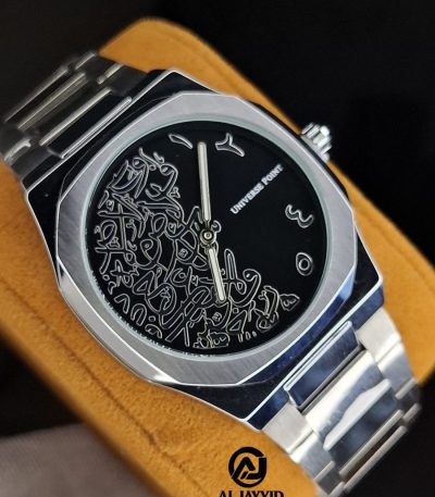 A Universe Point watch with a silver-colored metal bracelet and a black dial featuring intricate silver Arabic calligraphy.
