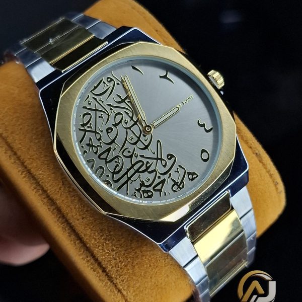 Close-up of the Universe Point Arabic Calligraphy Watch with its two-tone metal band resting on a brown cushion.