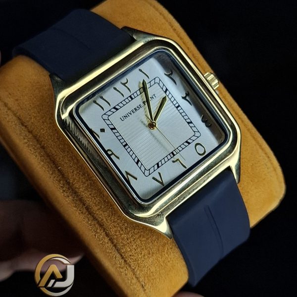 A close-up of the Universe Point watch, showing its square gold-tone case, white dial with Arabic numerals, and dark silicone strap.