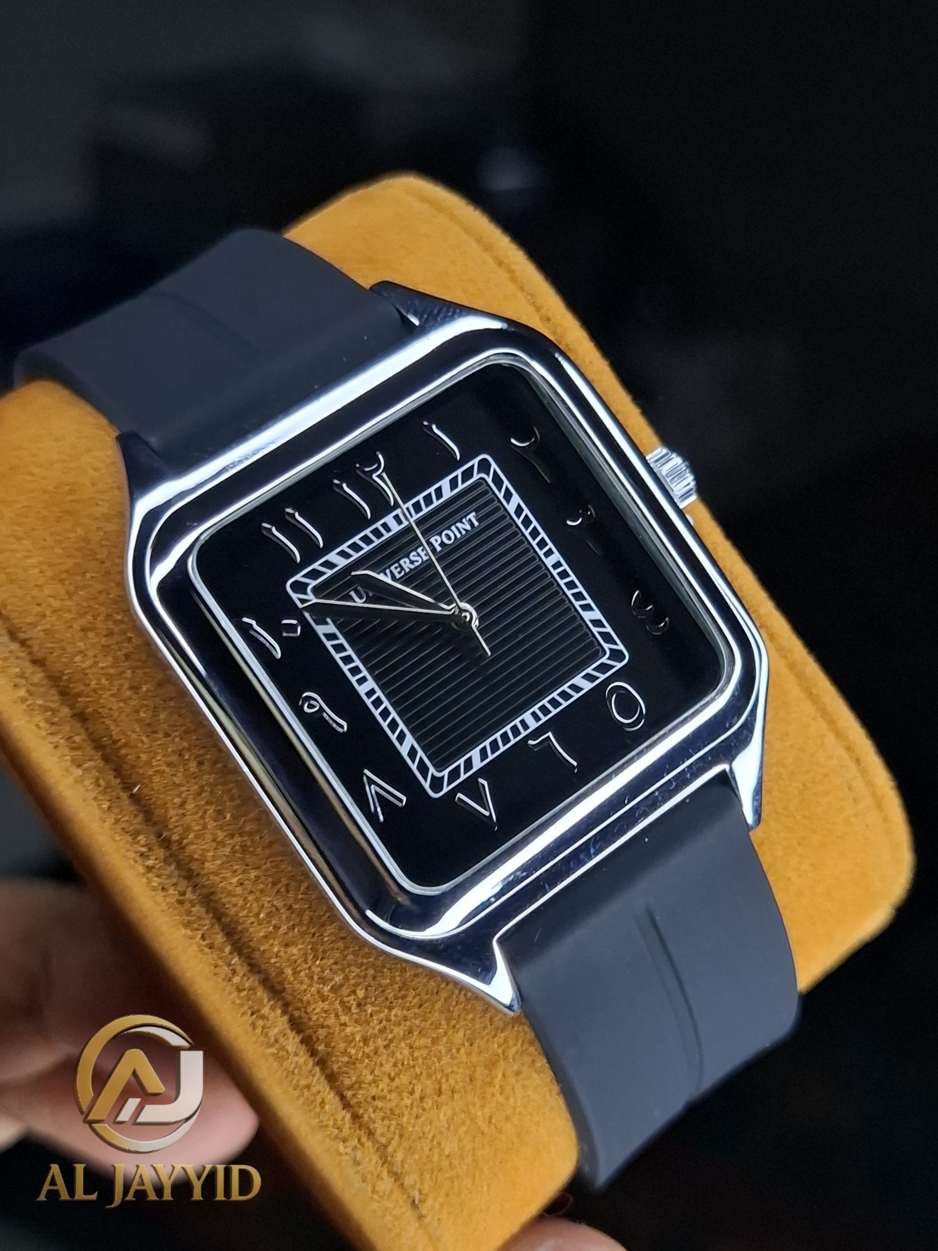 Universe Point Watch with Arabic Numerals Universe Point Watch with a square black dial, silver case, Arabic numerals, and a black silicone strap, shown at an angle.