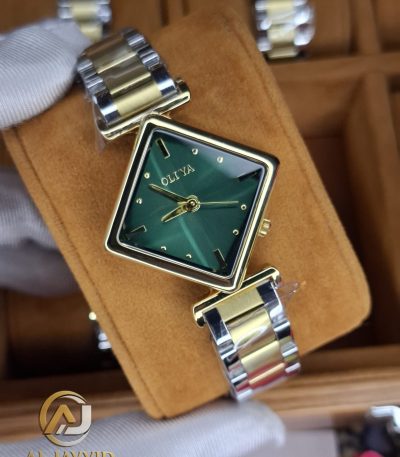 Close-up of the OLIYA 6819 women's watch, showing its square green dial, gold-tone case, and two-tone metal bracelet.