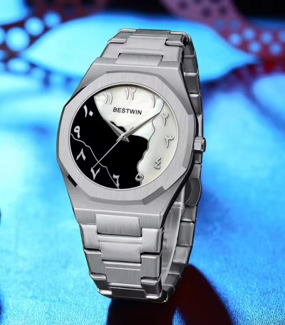 A silver Bestwin 812 watch with an octagonal case and a unique black and white dial featuring Arabic numerals.