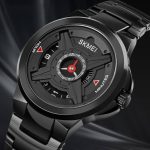 A close-up of the Skmei 1699 X Shape men's watch, featuring a unique black dial with red details and a black steel band.
