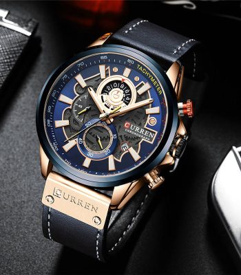 A close-up of the CURREN 8380 chronograph mens watch, showing its blue and gold-tone dial and black leather strap.