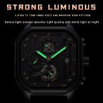 A close-up of the Poedagar 628 Minimalist Wrist Watch in black, showing its luminous hands glowing in the dark.