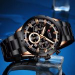 A CURREN 8355 men's sports chronograph watch in black stainless steel with rose gold accents, resting on an ice cube.