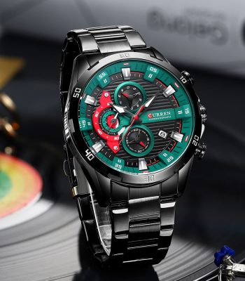 A close-up of the Curren 8402 watch in black, featuring its distinctive green and red detailed chronograph dial.