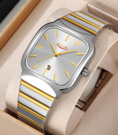 A close-up of the SKMEI 9361 stainless steel watch for men, featuring a silver and gold two-tone band and a silver dial.
