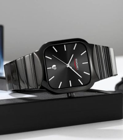 A close-up of the SKMEI 9361 luxury watch for men, featuring a black square dial and a matching stainless steel band.