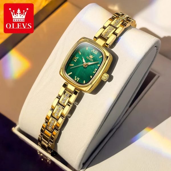 Front view of the OLEVS 3695 Quartz Women's Watch featuring a gold case, green dial, and a gold bracelet with crystal accents.