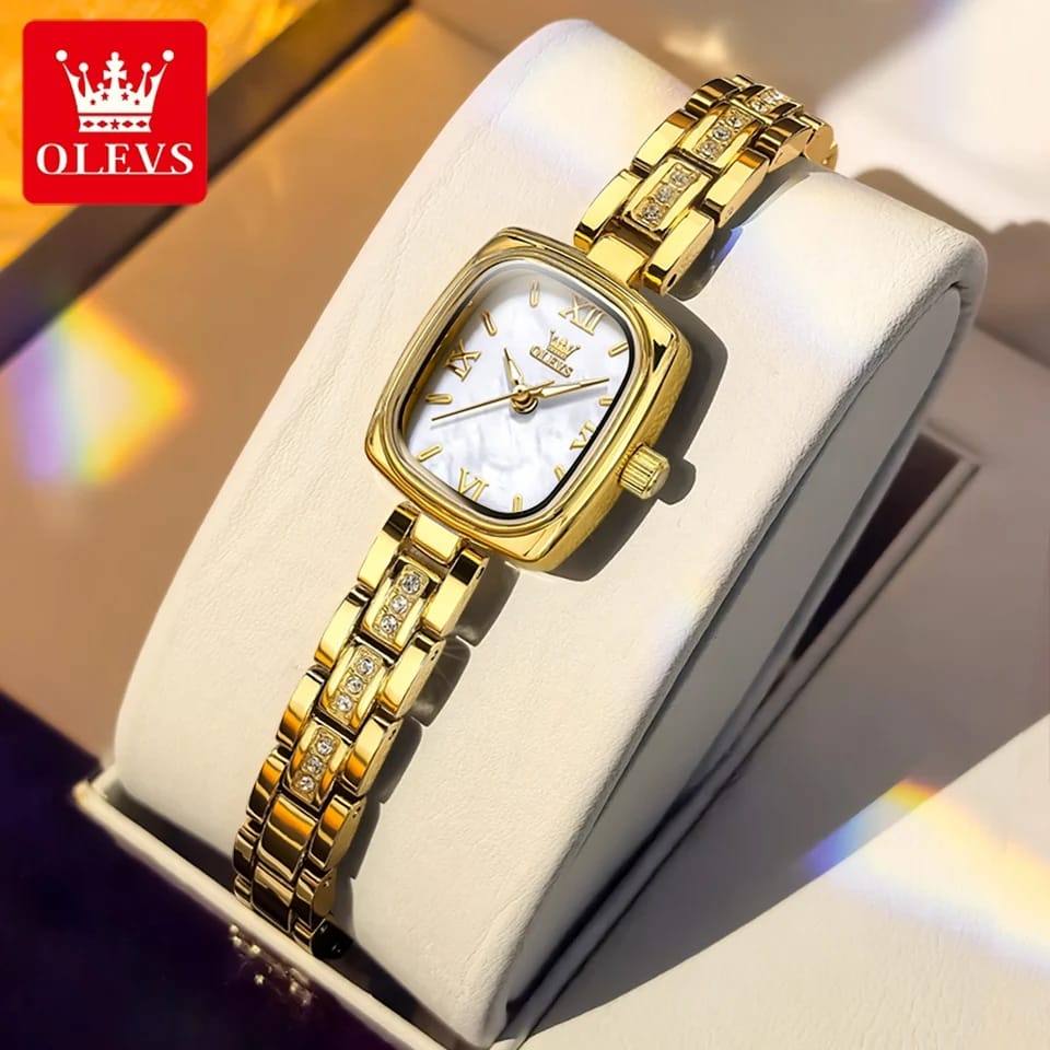 The OLEVS 3695 Women's Quartz Watch in gold and white, featuring a stone-accented link bracelet and a square face.