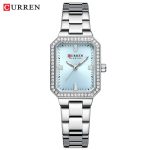 A CURREN 9102 silver stainless steel women's watch with a light blue rectangular face surrounded by small crystals.
