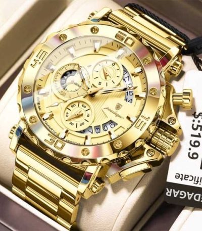 A close-up of the POEDAGAR 892 men's oversized steel quartz watch in gold, showing its detailed dial and metal band.