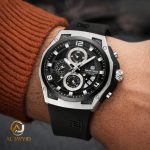 A close-up of the Naviforce 8051T Chronograph Quartz Watch on a person's wrist, showing its black and silver face.