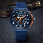Naviforce 8051T Blue Silicone Chronograph Watch shown at an angle on a dark textured surface, highlighting its blue and orange details.