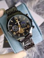 A close-up of the Poedagar 938 men's chronograph watch, featuring a full black stainless steel body and a detailed black dial.