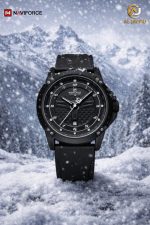 Front view of the NAVIFORCE 8031 men's black quartz watch with a black dial and strap, set against a snowy mountain background.