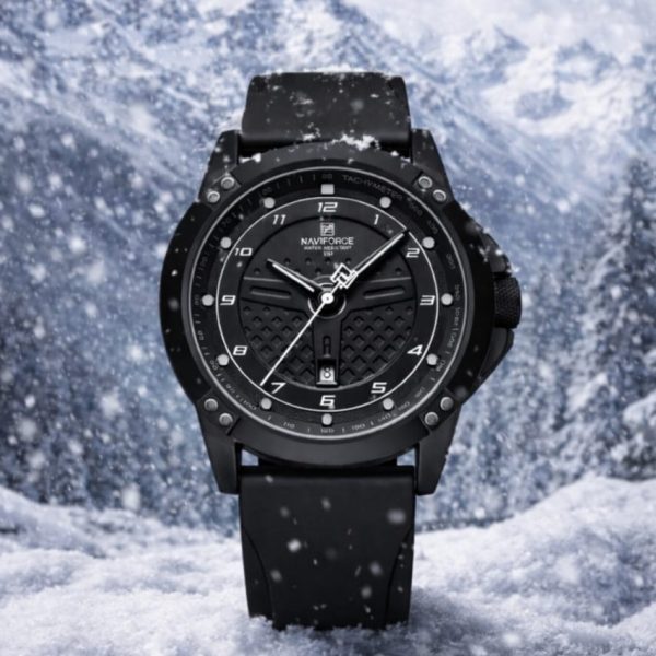 Front view of the NAVIFORCE 8031 men's black quartz watch with a black dial and strap, set against a snowy mountain background.