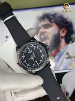 A gloved hand holding the NAVIFORCE 8031 Men's Black Quartz Watch, showcasing its black dial and matching silicone strap.