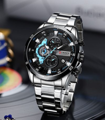 A front-angle view of the Curren 8402 watch, featuring a silver stainless steel band and a black dial with light blue accents.