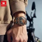 A man wearing the OLEVS 3645 Wood & Steel Moon Phase Chronograph watch on his wrist, shown against a blurred background.