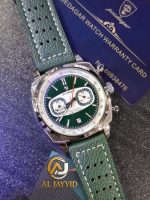 A silver Poedagar 838 luxury sports chronograph watch with a forest green dial and a matching textured green leather strap, displayed in a branded box. The watch features three sub-dials, a date window, and a silver tachymeter bezel.