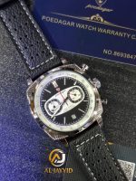 A silver Poedagar 838 luxury sports chronograph watch with a forest green dial and a matching textured green leather strap, displayed in a branded box. The watch features three sub-dials, a date window, and a silver tachymeter bezel.