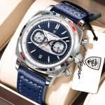 A silver Poedagar 838 luxury sports chronograph watch with a forest green dial and a matching textured green leather strap, displayed in a branded box. The watch features three sub-dials, a date window, and a silver tachymeter bezel.
